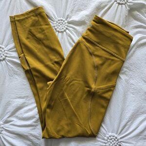 Lululemon Invigorate High-Rise Tight 25" Gold Leggings